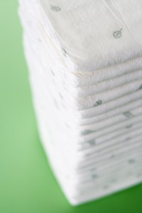 Keep diapers conveniently nearby at change time in a homemade diaper stacker.