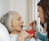 An Oregon homecare worker may help a client with activities of daily living such as eating, bathing and grooming.