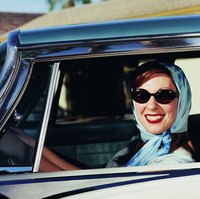 Airy scarves were iconic of 1950s style for women.