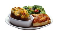 Bake or reheat twice-baked potatoes in a toaster oven for a hearty side dish.
