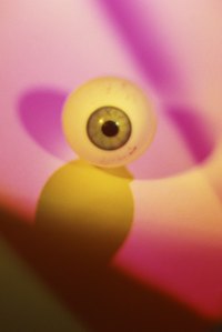 Create a realistic eye with polymer clay.