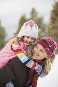 Create different patterns in knit hats by using different color yarns.