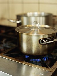 Use your stove to heat the water.
