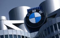 Close-up of the BMW emblem at the top of the BMW corporate headquarters building