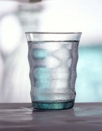 Condensation is the sweat on the outside of glasses, on windows and on walls