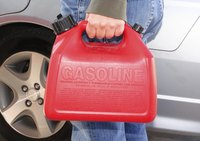 Close-up gas can in man's hand