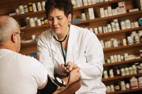 Adult female doctor with patient