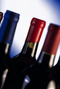 The sweetness of red wine attracts flies, and the alcohol kills them.