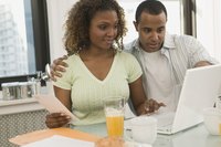 Adult couple working online
