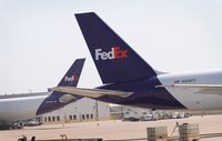Large FedEd tail ad on plane