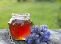 Never boil or scorch honey to remove the cloudiness.