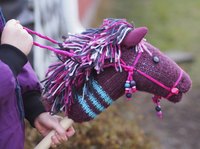 Stick horses can be customized for each rider by using different colored socks, fabrics and yarn.