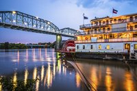 Watch the city lights as you enjoy dinner and celebrate on a riverboat like this one in Chattanooga, Tennessee.