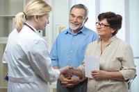An older couple at the doctor's.