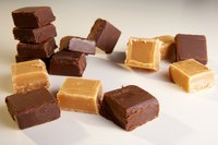 Pour the milk mixture over the chocolate and stir gently.