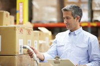 Warehouse worker scanning a barcode.