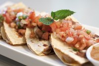 Kimchee adds a Korean twist to chicken quesadillas.