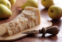 Homemade parmesan cheese on cutting board