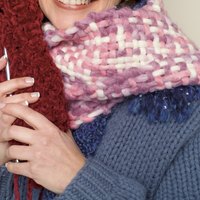 Use a Knifty Knitter to create a handmade scarf.