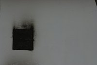 Soot leaves an oily residue on any surface it comes in contact with.