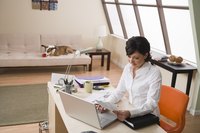 A woman is working in an office.