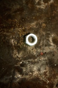 Adjusting the hex nut will help you repair your brakes.