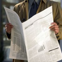 Fold a newspaper into a keepsake.