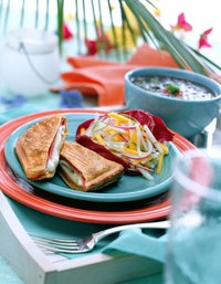 Upgrade your grilled cheese with a panini press, meat and vegetables.