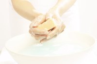 Clean the infected area and your hands daily to prevent spreading bacteria.
