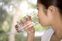 Drinking water helps reduce bloating.