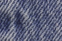 Embellish denim pants, jackets or other garments with paint.