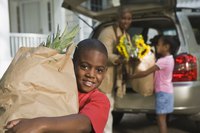 Family unloading groceries