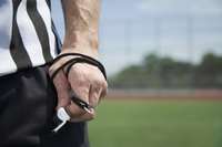 High school football referees are responsible for purchasing their own equipment, such as whistles, shirts and shoes.