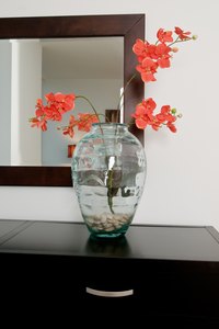 Clear vases can decoratively display a full range of objects.