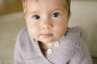Baby looks good in a fashionable sweater.
