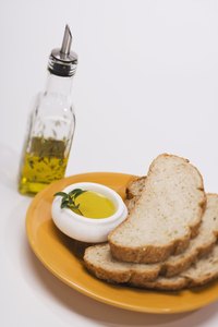 Most Italian restaurants serve bread and herb infused olive oil for dipping.