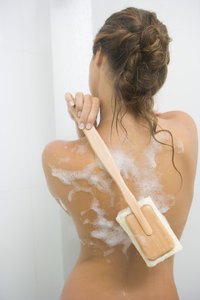 Cultured marble is more expensive but will last longer than a fiberglass shower.