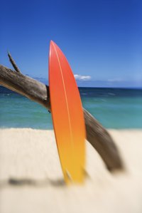 A surfboard can be made into a coffee table.