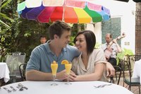 Mimosas, often served garnished with orange slices, add sparkle to a meal.