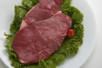 Cook top sirloin steak on a flat surface to seal in the moisture and flavor.