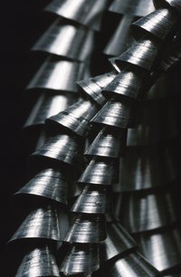 Ferrofluid climbs up objects that have exposed details and ridges.