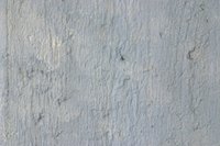 Cover concrete with vinyl siding to give it an updated appearance.