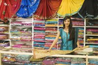 Saris come in a variety of colors, designs and sizes.