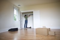 White paint creates a neutral closet space.