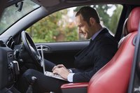 Companies pay car reimbursements either before or after business travel.