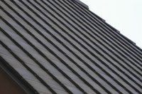 The weight of slate roofs makes them expensive to remove.
