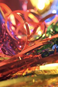 Tissue paper party decorations are both inexpensive and easy to make.