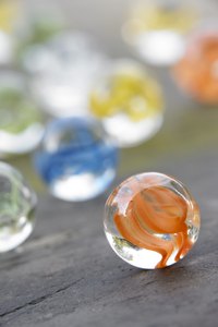 Recycle marbles into a colorful fashion necklace.