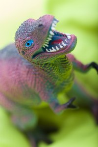 Use a dinosaur toy for inspiration when creating your pinata.