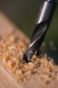 Sharpen bits by hand with a block sharpener.